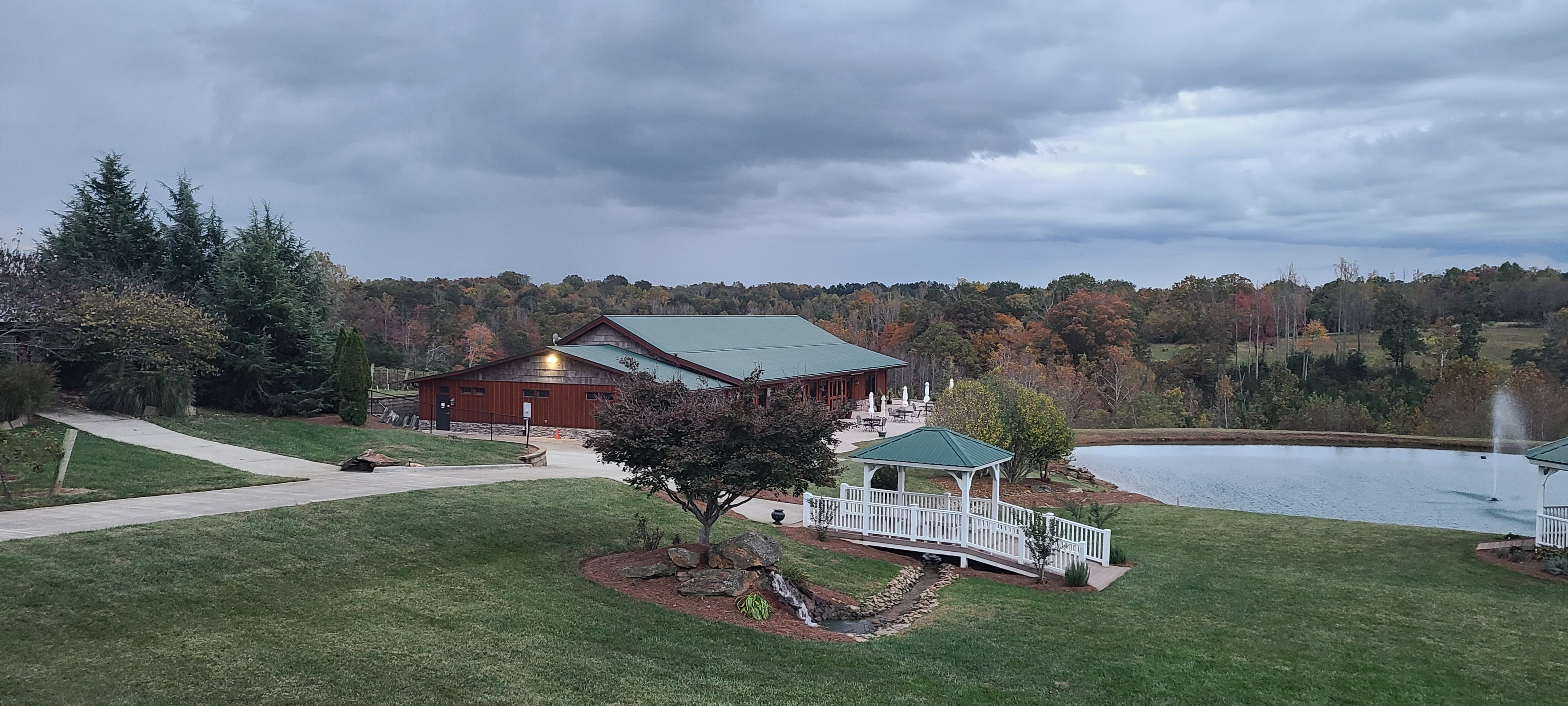 Couple portrait at Autumn Creek Vineyards during golden hour